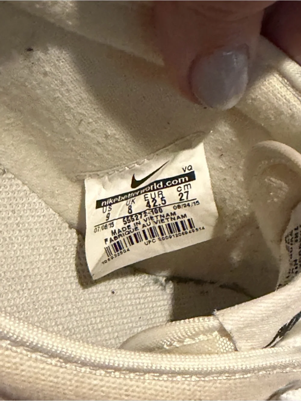 Nike White Canvas Low-Top Sneakers with Black Swoosh